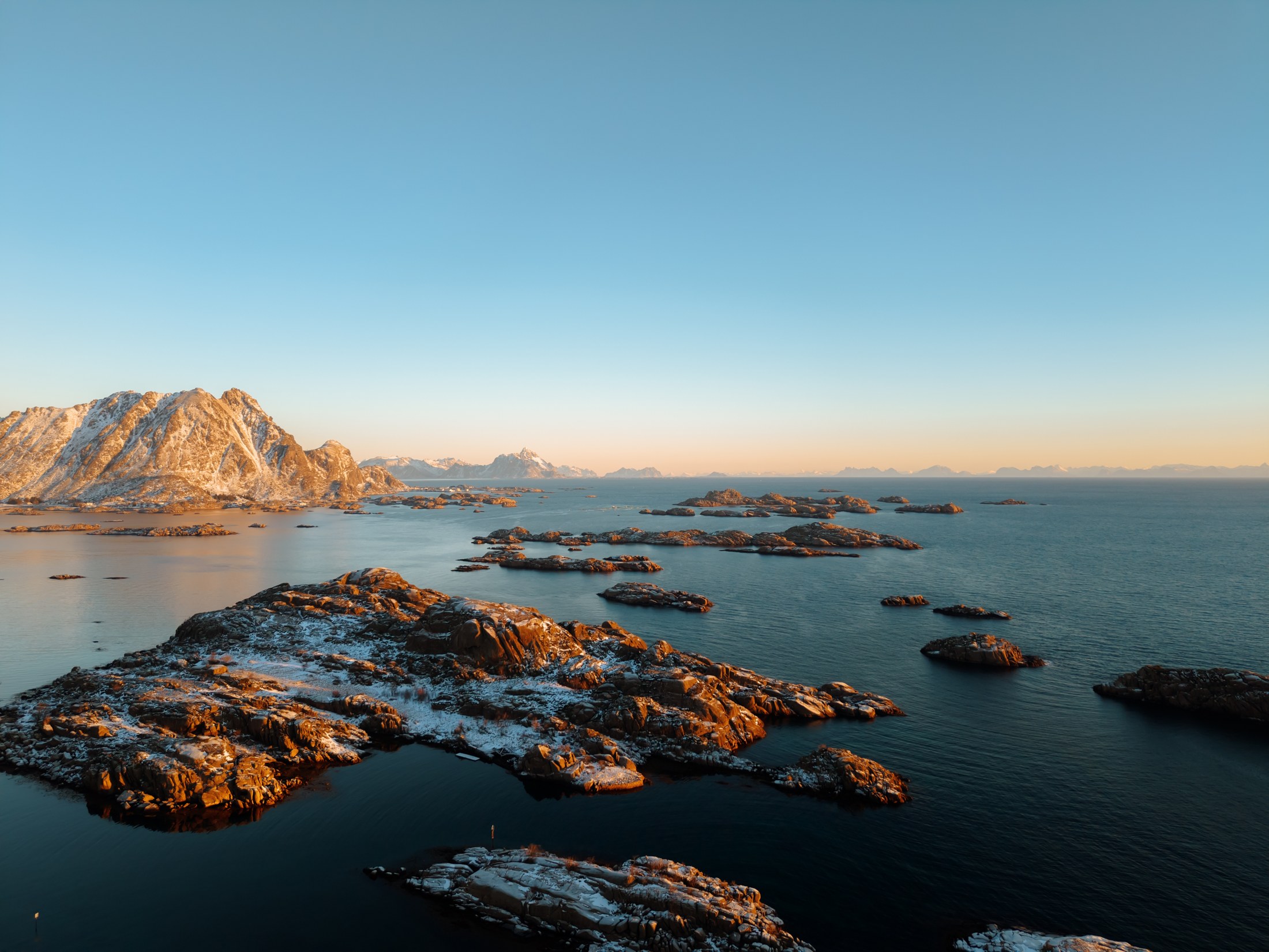 Winter light over islands in the Norwegian Sea near URE